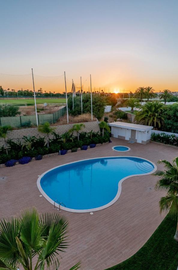 Sunset Condominium Lagos Bagian luar foto